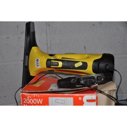 1110 - A KARCHER WINDOW VAC with two interchangeable heads and charger, a Tesco vacuum cleaner (no pipe to ... 