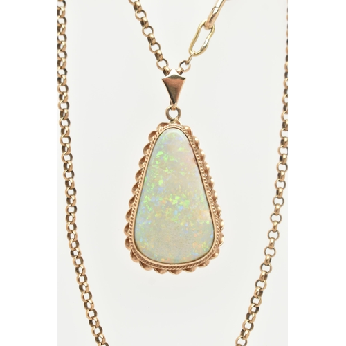 15 - AN OPAL PENDANT AND CHAIN, the triangular opal within a collet and double rope twist surround, suspe... 