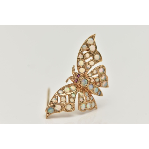 17 - A 9CT GOLD OPAL AND RUBY BUTTERFLY BROOCH, the butterfly body and wings set with circular opal caboc... 