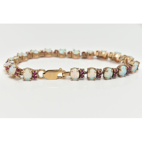 18 - A 9CT GOLD OPAL AND RUBY BRACELET, designed as oval opal cabochons each interspaced by two circular ... 