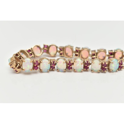 18 - A 9CT GOLD OPAL AND RUBY BRACELET, designed as oval opal cabochons each interspaced by two circular ... 