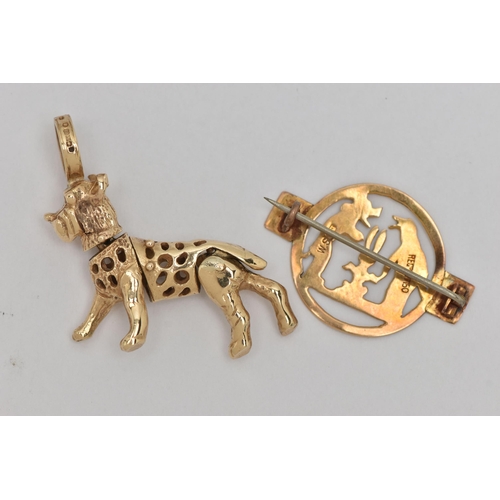 20 - A PENDANT AND A BROOCH, the pendant designed as an articulated dog, with 9ct hallmark, the brooch of... 