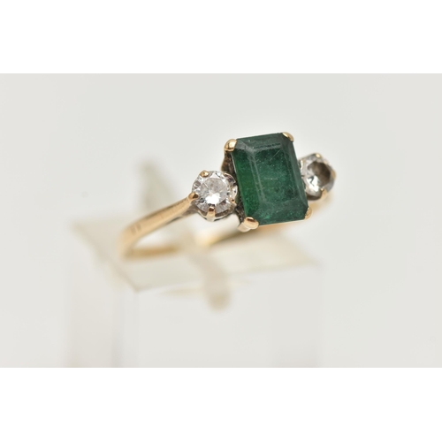 24 - A 9CT GOLD EMERALD AND DIAMOND RING, designed as a central emerald cut emerald in a four claw settin... 