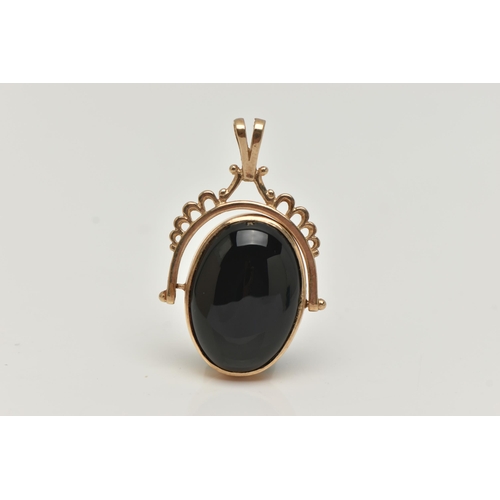 26 - A 9CT GOLD SWIVEL FOB, the oval fob set with an onyx and dyed chalcedony cabochon, to the scallop de... 