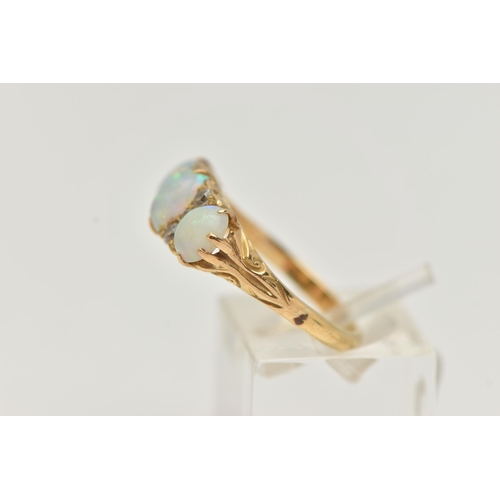 29 - A LATE VICTORIAN OPAL AND DIAMOND RING, designed as three oval opal cabochons interspaced by a total... 