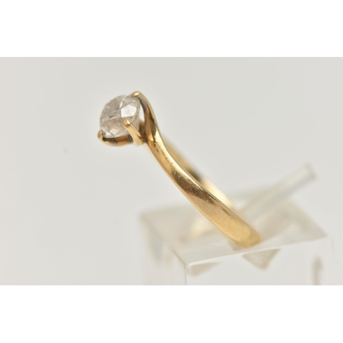 31 - A SINGLE STONE DIAMOND RING, round brilliant cut diamond, four prong set in a 18ct yellow gold twist... 