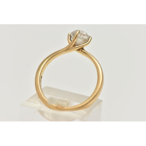 31 - A SINGLE STONE DIAMOND RING, round brilliant cut diamond, four prong set in a 18ct yellow gold twist... 