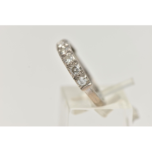 33 - A DIAMOND HALF ETERNITY RING, eight round brilliant cut diamonds grain set in white metal, approxima... 