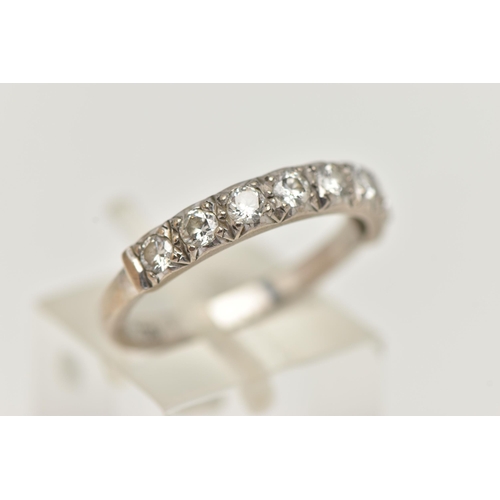 33 - A DIAMOND HALF ETERNITY RING, eight round brilliant cut diamonds grain set in white metal, approxima... 