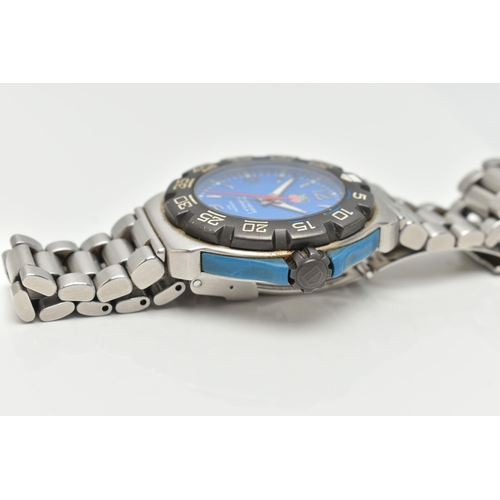 40 - A 'TAG HEUER' FORMULA 1 WRISTWATCH, quartz movement, round blue dial signed 'Tag Heuer' Formula 1 pr... 