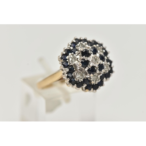 46 - A 9CT GOLD DIAMOND AND SAPPHIRE CLUSTER RING, single cut diamond and circular cut blue sapphires, pr... 