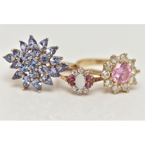 47 - THREE GEM SET RINGS, to include a tanzanite cluster ring, prong set in yellow gold, hallmarked 9ct B... 