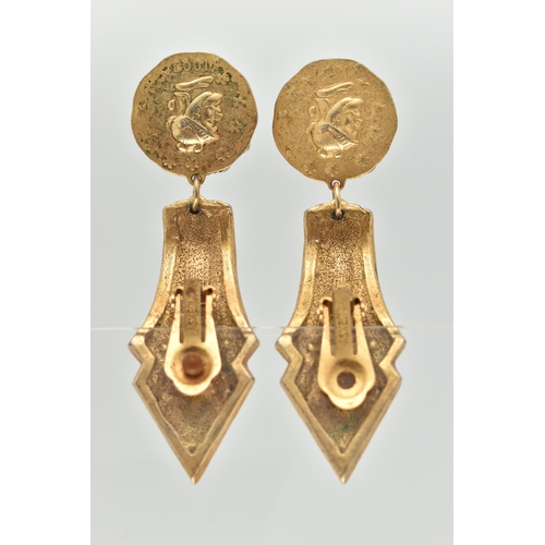 57 - A PAIR OF 'ASKEW' CLIP ON EARRINGS, a pair of large statement earrings, yellow metal and paste, fitt... 