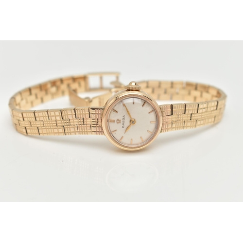 67 - A LADIES 9CT GOLD 'OMEGA' WRISTWATCH, manual wind, round silvered dial signed 'Omega', baton markers... 