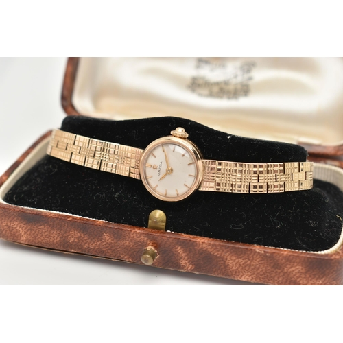 67 - A LADIES 9CT GOLD 'OMEGA' WRISTWATCH, manual wind, round silvered dial signed 'Omega', baton markers... 