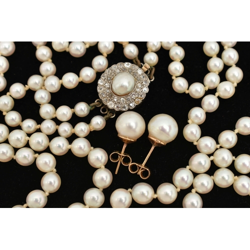 69 - A CULTURED PEARL NECKLACE AND EARRINGS, a double strand graduated cultured pearl necklace, white pea... 