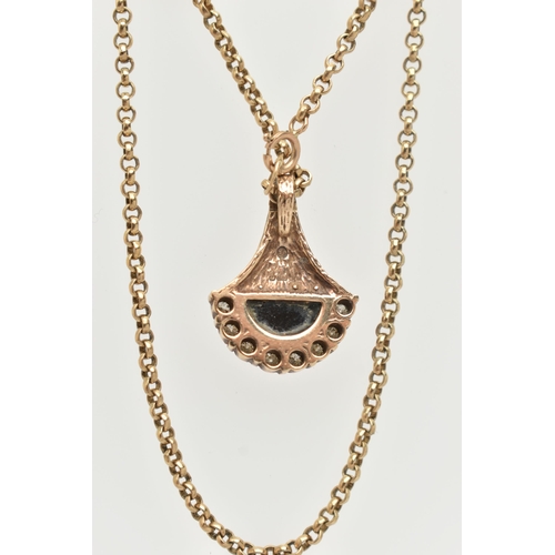 8 - A 9CT YELLOW GOLD DIAMOND AND ONXY PENDANT WITH CHAIN, the abstract design pendant set with an onyx ... 