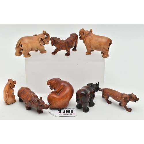 100 - EIGHT 20TH CENTURY CARVED TREEN NETSUKE, carved as rhinos, an elephant, tiger and other large cats, ... 