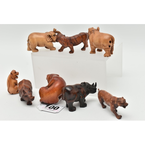 100 - EIGHT 20TH CENTURY CARVED TREEN NETSUKE, carved as rhinos, an elephant, tiger and other large cats, ... 