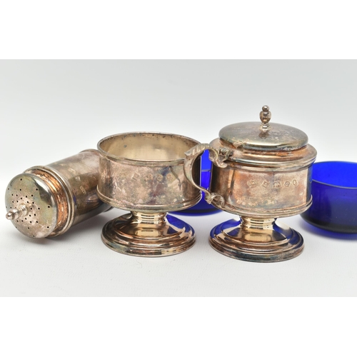 115 - THREE SILVER CONDIMENT PIECES, matching set to include a pepperette, mustard and salt both with blue... 