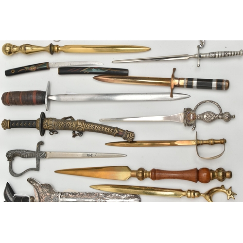 128 - THIRTY SEVEN LETTER OPENERS IN THE FORM OF SWORDS / DAGGERS, including a horn handled white metal ex... 