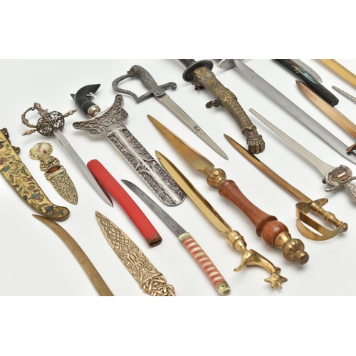 128 - THIRTY SEVEN LETTER OPENERS IN THE FORM OF SWORDS / DAGGERS, including a horn handled white metal ex... 