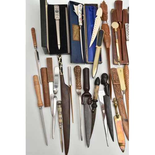 136 - APPROXIMATELY EIGHTY ASSORTED LETTER OPENERS IN TREEN, PLASTIC AND ASSORTED BASE METALS, includes a ... 