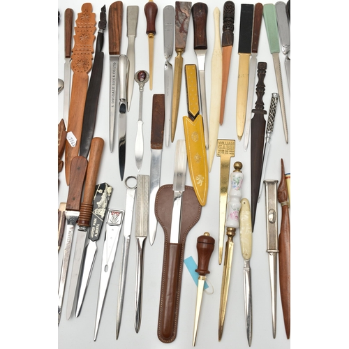 136 - APPROXIMATELY EIGHTY ASSORTED LETTER OPENERS IN TREEN, PLASTIC AND ASSORTED BASE METALS, includes a ... 