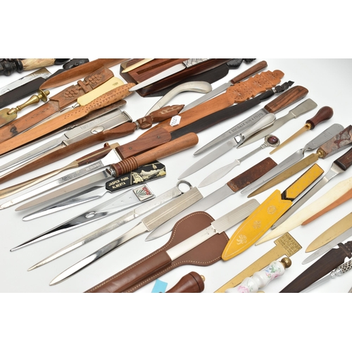 136 - APPROXIMATELY EIGHTY ASSORTED LETTER OPENERS IN TREEN, PLASTIC AND ASSORTED BASE METALS, includes a ... 