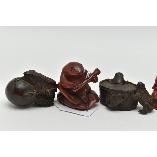 91 - SIX 20TH CENTURY CARVED TREEN NETSUKE, all in the form of frogs / toads, three with inset eyes, four... 