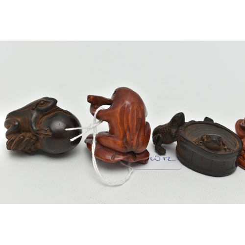 91 - SIX 20TH CENTURY CARVED TREEN NETSUKE, all in the form of frogs / toads, three with inset eyes, four... 