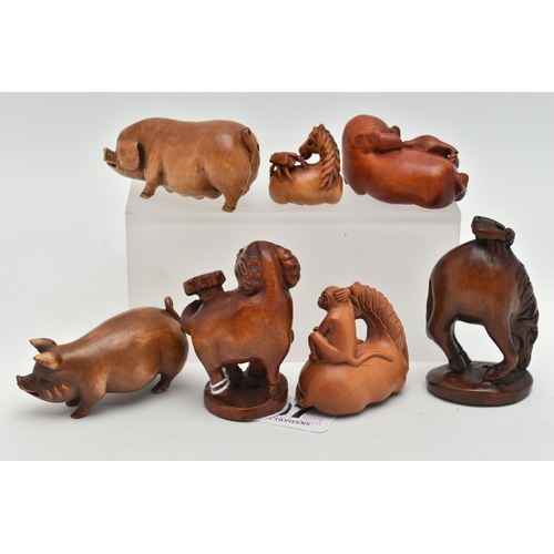 97 - SIX 20TH CENTURY CARVED TREEN NETSUKE AND AN OKIMONO, carved as pigs, horses, goat, etc, all with in... 