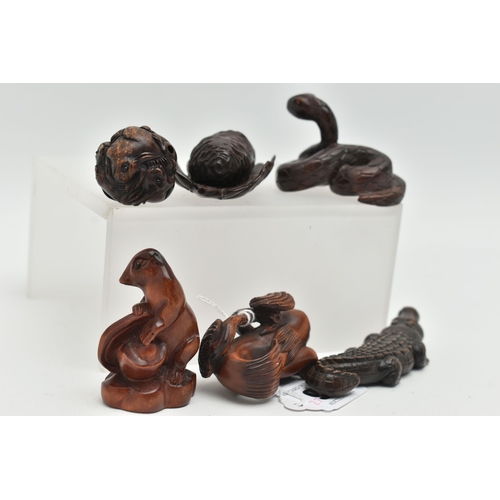 98 - FOUR 20TH CENTURY CARVED TREEN NETSUKE AND TWO OKIMONO, carved as a variety of animals / reptiles in... 