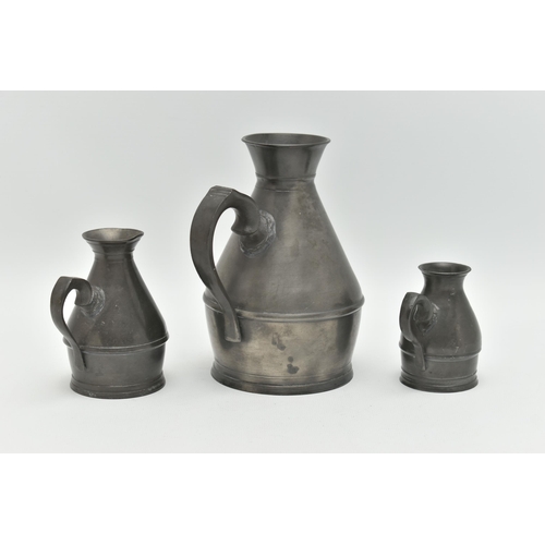 150 - A SET OF THREE PEWTER HAYSTACK MEASURES, largest measuring approximately 150mm height, smallest meas... 