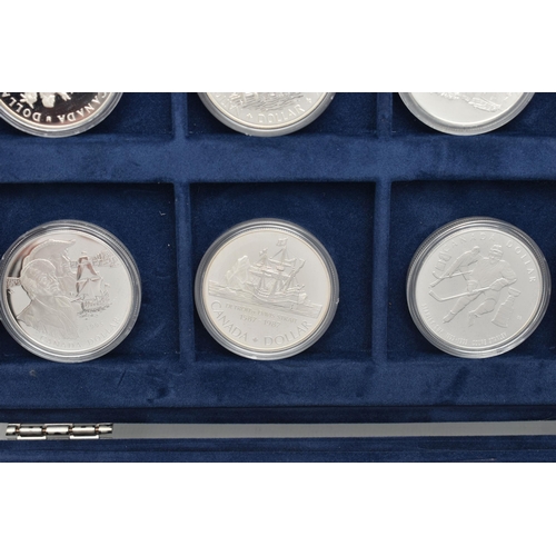 155 - A WESTMINSTER BOXED AMOUNT OF MAINLY SILVER ROYAL CANADIAN MINT COINS, to include 13x 36mm or 38mm S... 