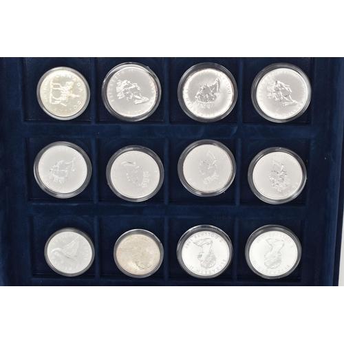 155 - A WESTMINSTER BOXED AMOUNT OF MAINLY SILVER ROYAL CANADIAN MINT COINS, to include 13x 36mm or 38mm S... 