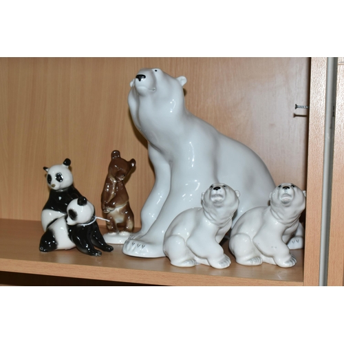 334 - A GROUP OF LOMONOSOV POLAR BEARS AND OTHER ANIMALS, comprising a large Polar Bear, height 27cm x len... 