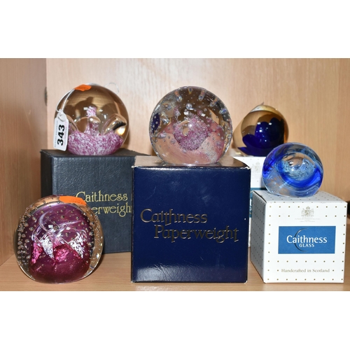 343 - FIVE CAITHNESS GLASS PAPERWEIGHTS, comprising four boxed 'Pink Champagne', 'Moonflower', 'Cauldron',... 