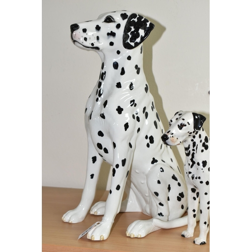 345 - A BESWICK DALMATIAN AND TWO ROYAL DOULTON FIGURES, comprising a large Beswick Fireside Models seated... 