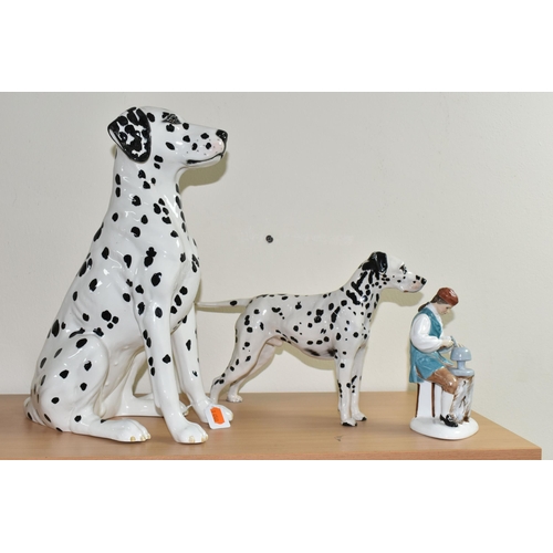 345 - A BESWICK DALMATIAN AND TWO ROYAL DOULTON FIGURES, comprising a large Beswick Fireside Models seated... 