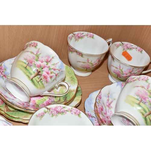 353 - A TWENTY PIECE ROYAL ALBERT BLOSSOM TIME PART TEA SET, comprising a shell shaped sugar bowl, seven t... 