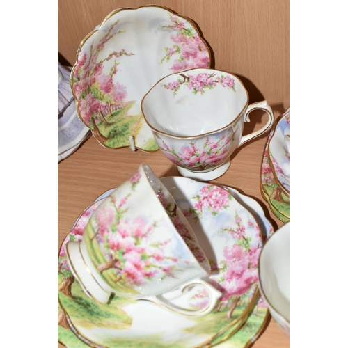 353 - A TWENTY PIECE ROYAL ALBERT BLOSSOM TIME PART TEA SET, comprising a shell shaped sugar bowl, seven t... 