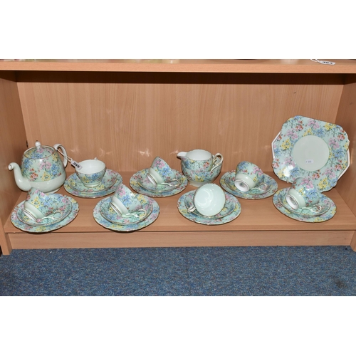 355 - A TWENTY FIVE PIECE SHELLEY 'MELODY' TEA SET, comprising a teapot, a cake plate, a cream jug, a suga... 