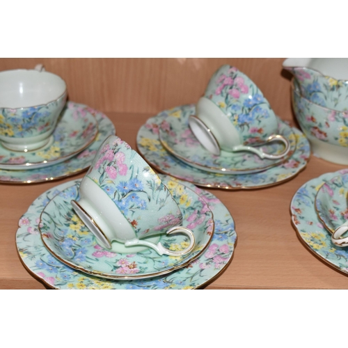 355 - A TWENTY FIVE PIECE SHELLEY 'MELODY' TEA SET, comprising a teapot, a cake plate, a cream jug, a suga... 