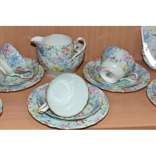 355 - A TWENTY FIVE PIECE SHELLEY 'MELODY' TEA SET, comprising a teapot, a cake plate, a cream jug, a suga... 