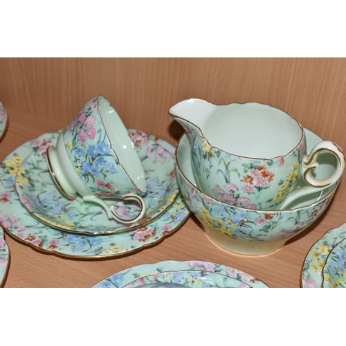 355 - A TWENTY FIVE PIECE SHELLEY 'MELODY' TEA SET, comprising a teapot, a cake plate, a cream jug, a suga... 