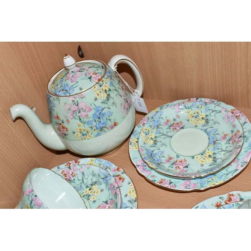 355 - A TWENTY FIVE PIECE SHELLEY 'MELODY' TEA SET, comprising a teapot, a cake plate, a cream jug, a suga... 