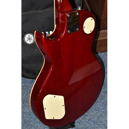 368 - A 'VINTAGE' LES PAUL TYPE GUITAR, bolt on neck, soft case and shoulder strap, cherry burst colour (1... 