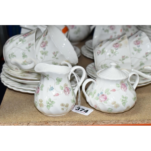 374 - A WEDGWOOD 'ROSEHIP' PATTERN TEA SET,  comprising teapot, milk jug, sugar bowl, a small teapot, milk... 