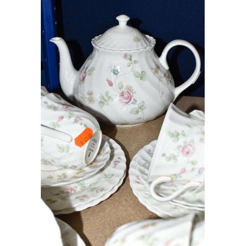 374 - A WEDGWOOD 'ROSEHIP' PATTERN TEA SET,  comprising teapot, milk jug, sugar bowl, a small teapot, milk... 